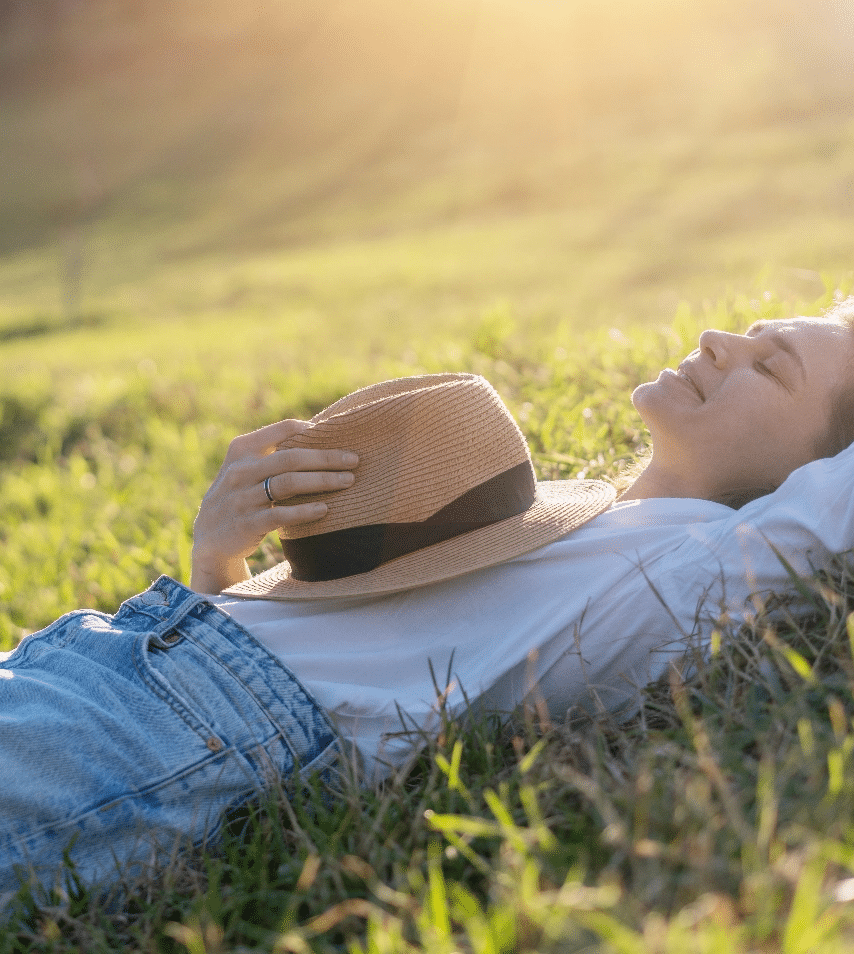 Woman Relaxing in a Meadow